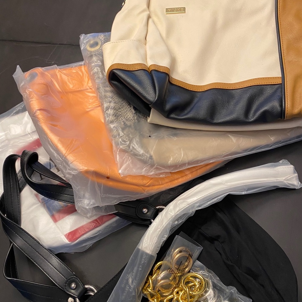 Miche handbags Set of 4.  New in wrapper.